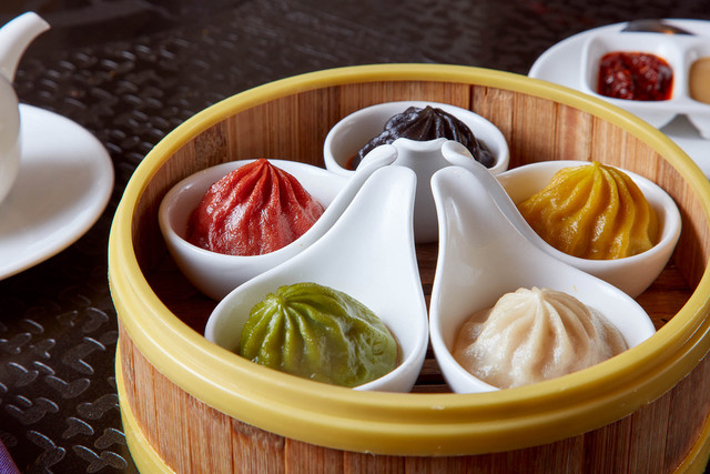 Dragon Beaux signature dishes Five Guys Xiao Long Bao, Squid Ink Siu Mai, Lava Egg Yolk Buns, Abalone Tarts